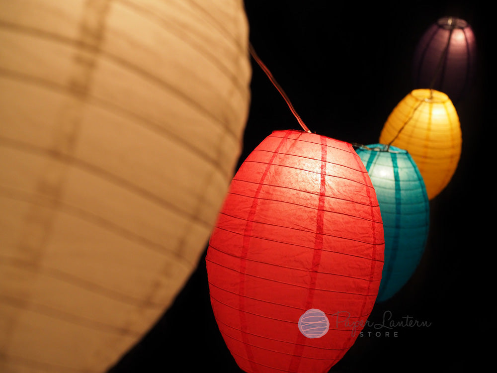 https://www.paperlanternstore.com/cdn/shop/products/easter-egg-kawaii-vibrant-paper-lantern-string-light-combo-image-1.jpg?v=1585197060