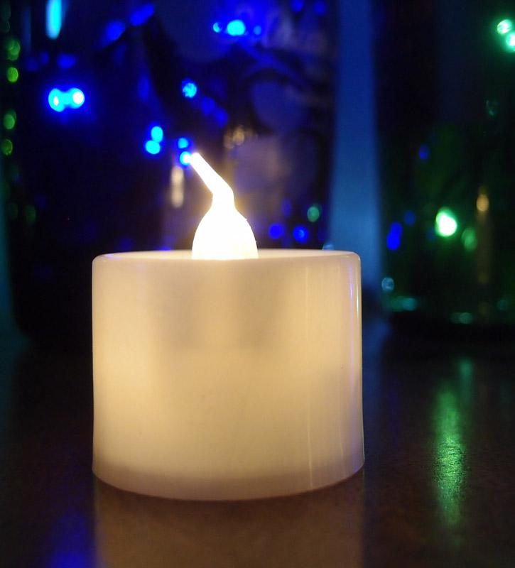 https://www.paperlanternstore.com/cdn/shop/products/large-led-battery-operated-flameless-candle-warm-white-image-2.jpg?v=1655756336